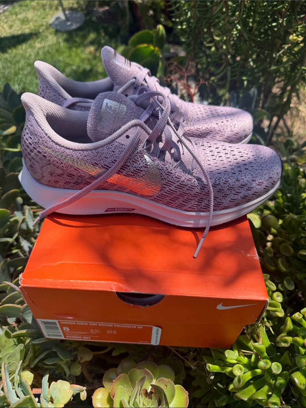 Nike Women's Lavender Mesh Running Shoes with Orange Swoosh